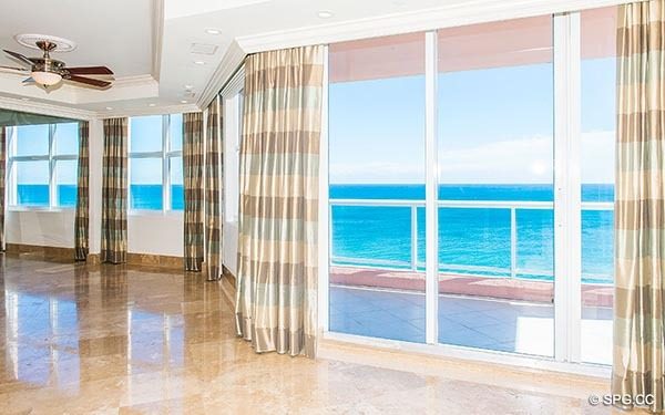 Living Room Terrace Access inside Residence 14E, Tower I at The Palms, Luxury Oceanfront Condominiums in Fort Lauderdale, Florida 33305.