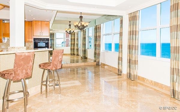 Dining Area and Kitchen inside Residence 14E, Tower I at The Palms, Luxury Oceanfront Condominiums in Fort Lauderdale, Florida 33305.