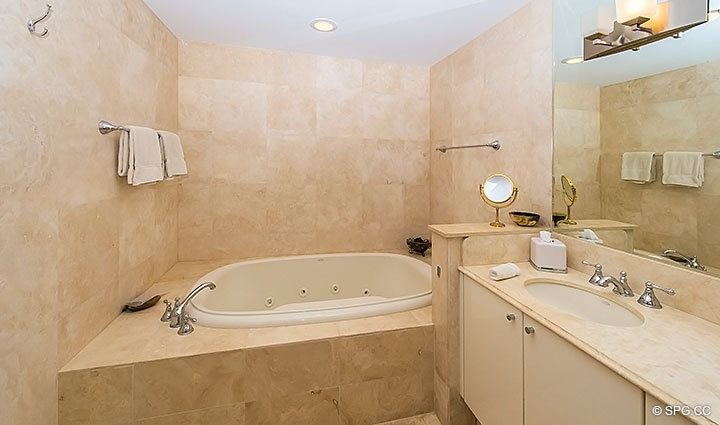 Beautiful Marble Bathroom with Whirlpool Tub in Luxury Oceanfront Condo Residence 5152 Fisher Island Drive, Miami Beach, FL 33109