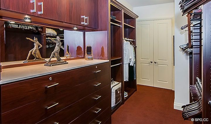 Large Walk-in Master Closet inside Residence 206 at Bellaria, Luxury Oceanfront Condominiums in Palm Beach, Florida 33480.